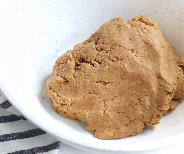 Cookie dough covered and chilling in the refrigerator before air fryer baking.