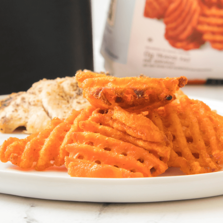 side view closeup: Alexia sweet potato fries air fryer recipe on a plate