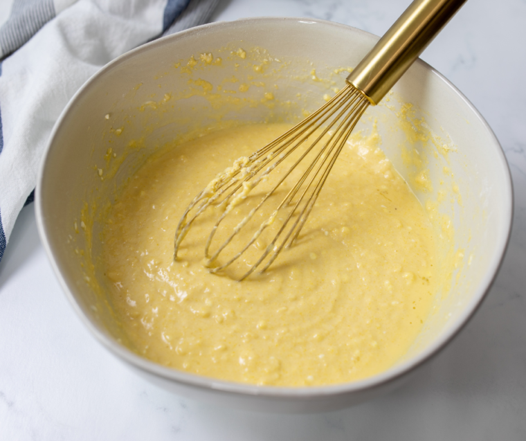 Creamy elote dipping sauce for street corn fritters stirred together in a small bowl