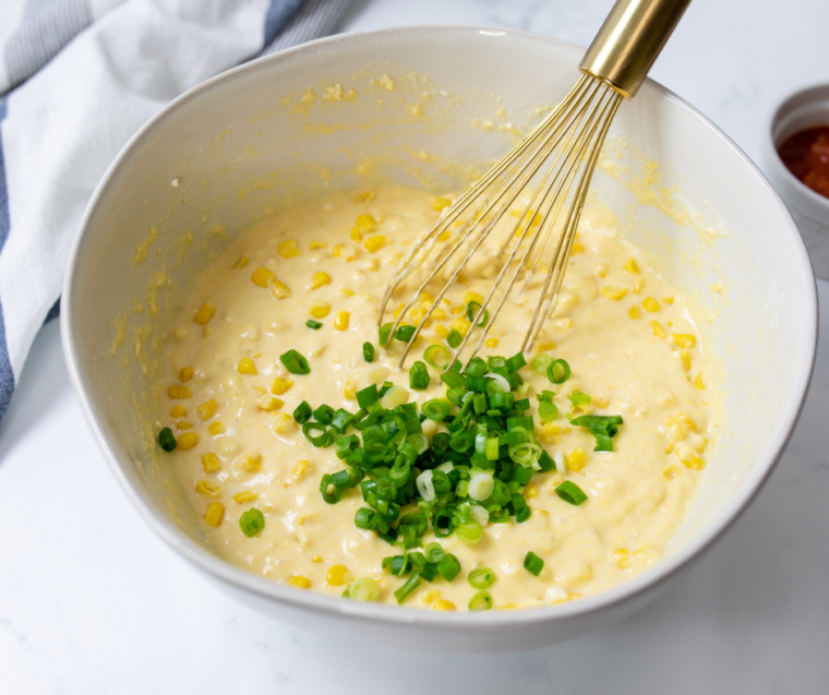 Street corn fritters with golden crispy crust cooking on the Blackstone griddle