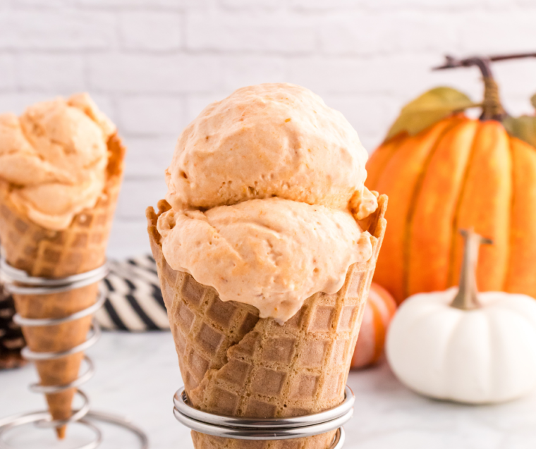 Bowl of creamy Ninja Creami keto pumpkin ice cream topped with pumpkin pie spice