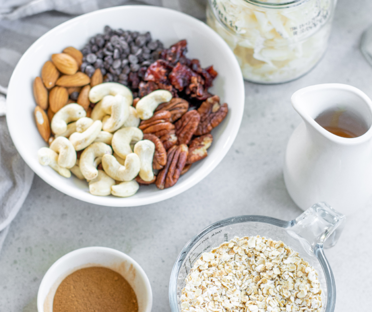 Oats, nuts, seeds, coconut flakes, honey, and dried fruit for homemade muesli