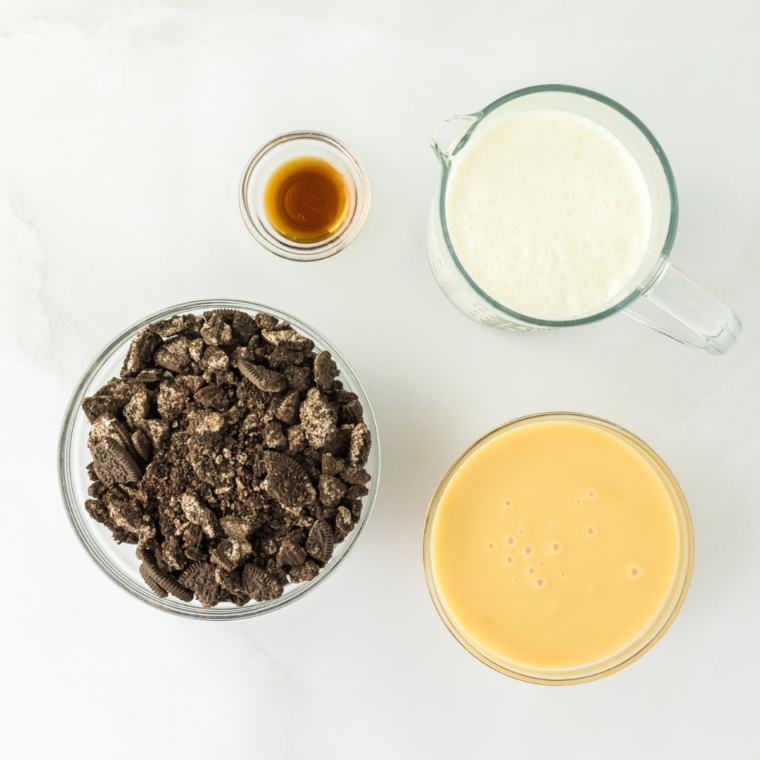 Ingredients needed for Ninja Creami Cookies and Cream on kitchen table.