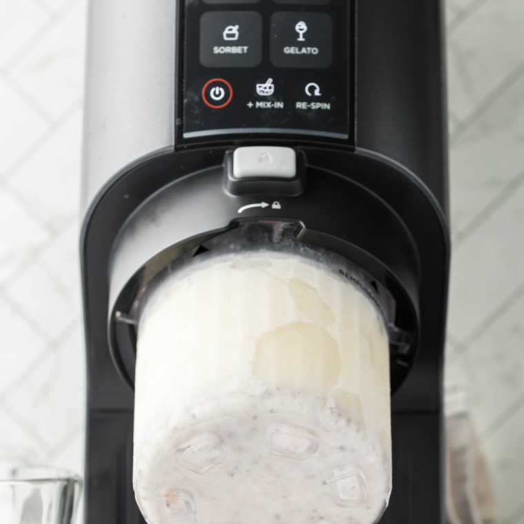 Process the frozen mixture in the Ninja Creami using the ice cream function until smooth and creamy.