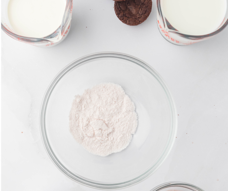 Ingredients needed for Ninja Creami Peanut Butter Ice Cream on kitchen table.