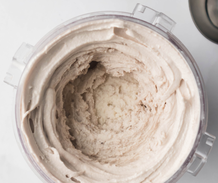 Use Ninja Creami's 'Mix-In' function for chocolate chips or peanuts, then scoop and enjoy. Add milk for creamier texture.