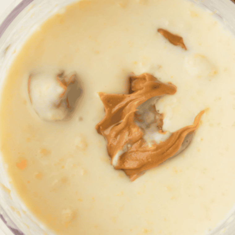 Blend peanut butter, protein powder, Greek yogurt, milk, and honey or maple syrup until smooth and fully combined.