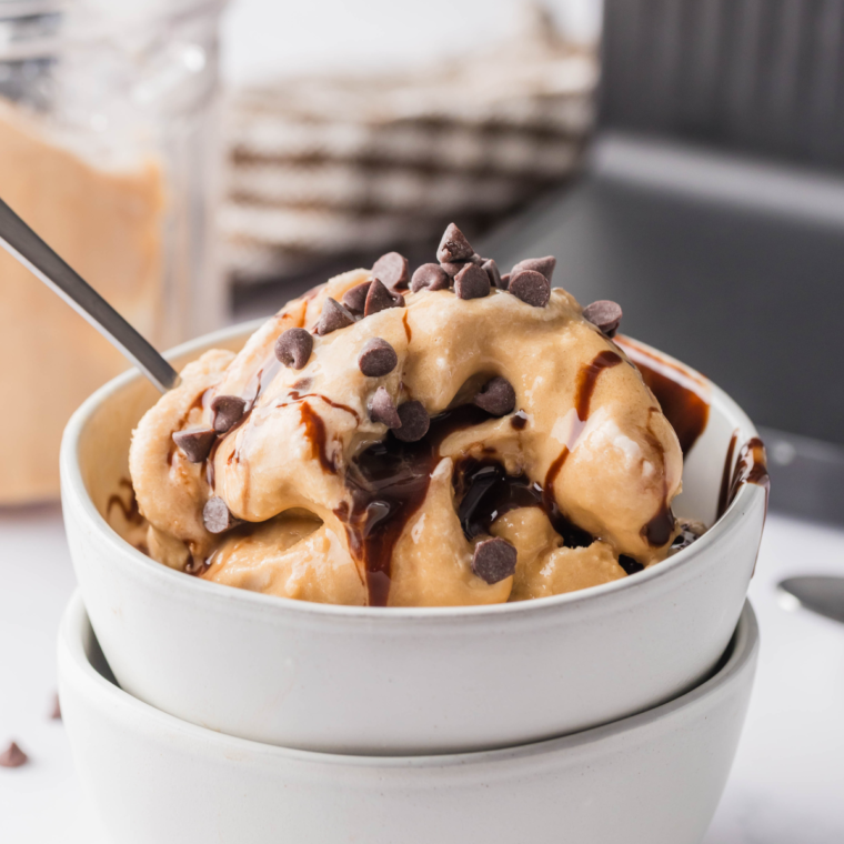 Creamy Ninja Creami Mocha Ice Cream in a bowl with a rich chocolate and coffee swirl, garnished with chocolate shavings.