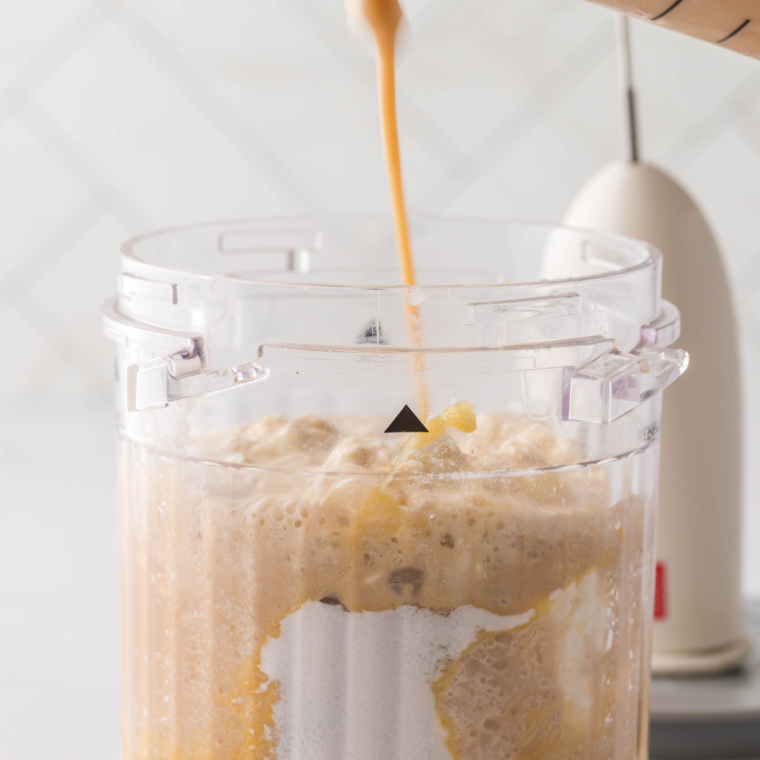 Blending the ingredients in the Ninja Creami Pint Container.