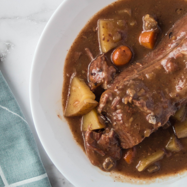 "Perfectly cooked roast beef made in the Ninja Foodi Possible Cooker Pro, tender and juicy with a golden brown crust."