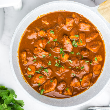 Air Fryer Chicken Vindaloo with tender, spiced chicken served with a flavorful curry sauce and garnished with cilantro.