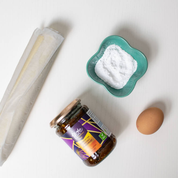 Ingredients needed for Air Fryer Mincemeat Pies on kitchen table.