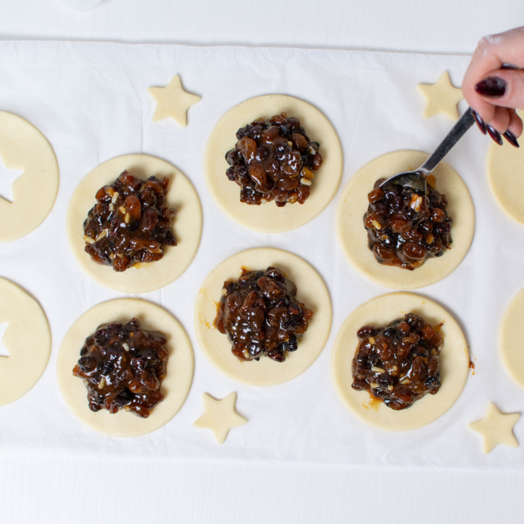 Filling pastry rounds with mincemeat mixture for Air Fryer Pies.
