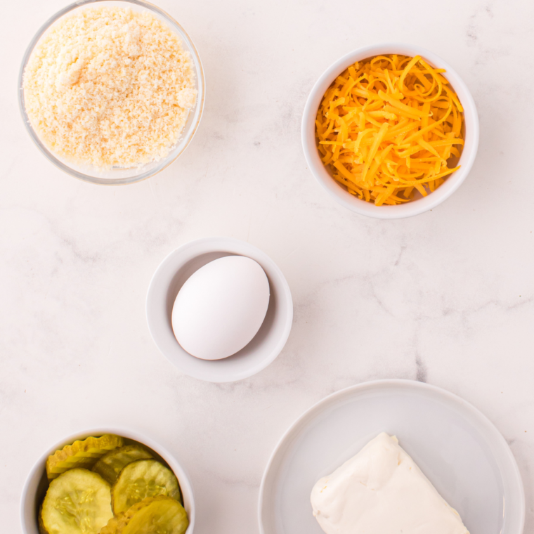 Ingredients needed on kitchen table, measured out in small bowls.