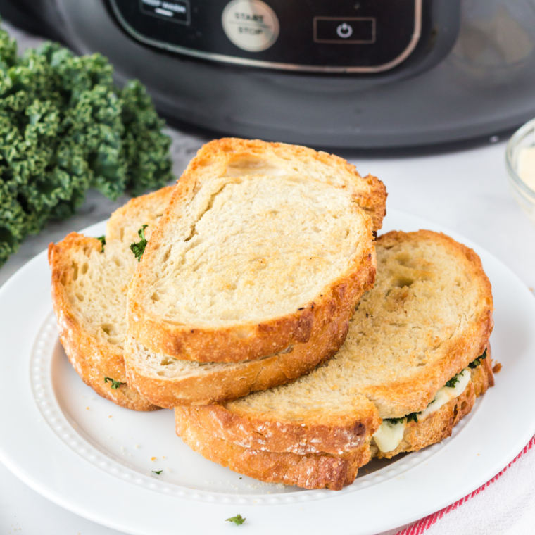 Air Fryer Provolone Broccoli Rabe Sandwich with melted provolone cheese, sautéed broccoli rabe, and crispy sourdough bread.