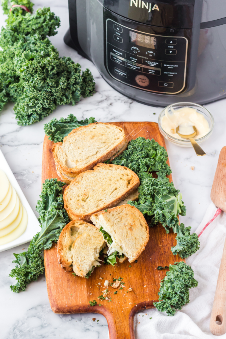 Air Fryer Provolone Broccoli Rabe Sandwich with melted provolone cheese, sautéed broccoli rabe, and crispy sourdough bread.