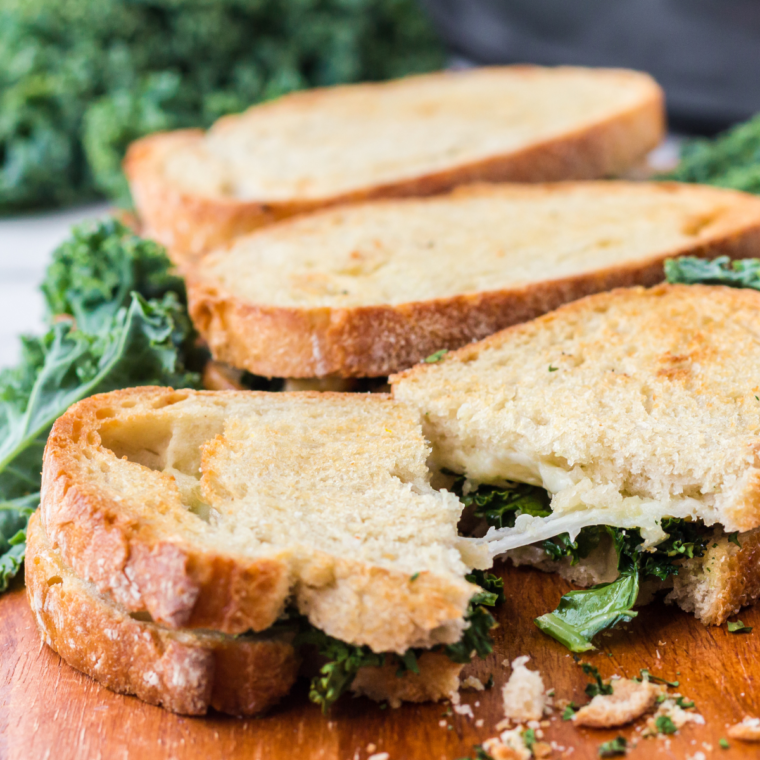 "Air Fryer Provolone Broccoli Rabe Sandwich with melted provolone cheese, sautéed broccoli rabe, and crispy sourdough bread toasted to perfection."