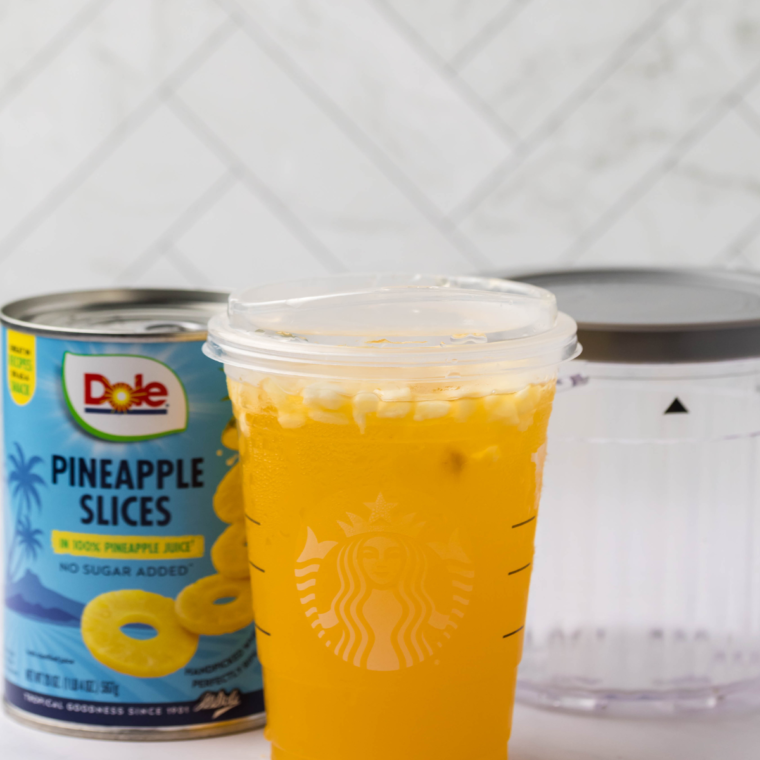 Ingredients needed for Ninja Creami Pineapple Passionfruit Lemonade Sorbet on kitchen table.