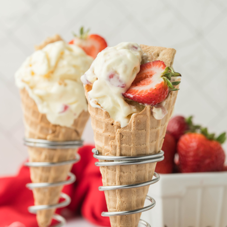 "Close-up of a swirl of creamy Ninja Creami Vanilla Soft Serve in a cone."
