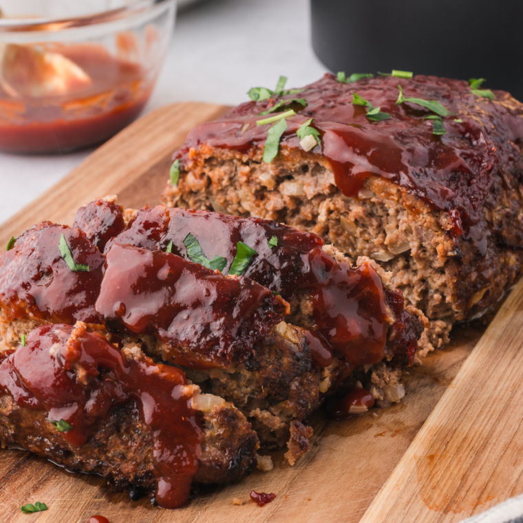 "Serving freshly baked Outback Steakhouse Spicy Jammin' Meatloaf."
