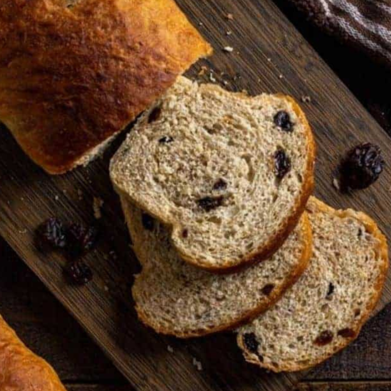 "Freshly baked Publix Breakfast Bread on a plate, showcasing its golden crust and fluffy interior, perfect for breakfast."
