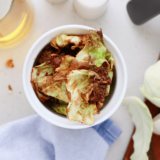 "Golden and crispy Air Fryer Cabbage Chips served in a bowl."