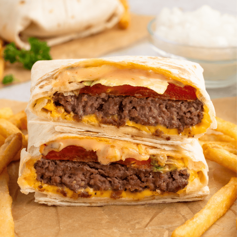 Close-up of a Copycat In and Out Burger Wrap with juicy beef patty, lettuce, cheese, tomato, and signature sauce, served as a low-carb option.