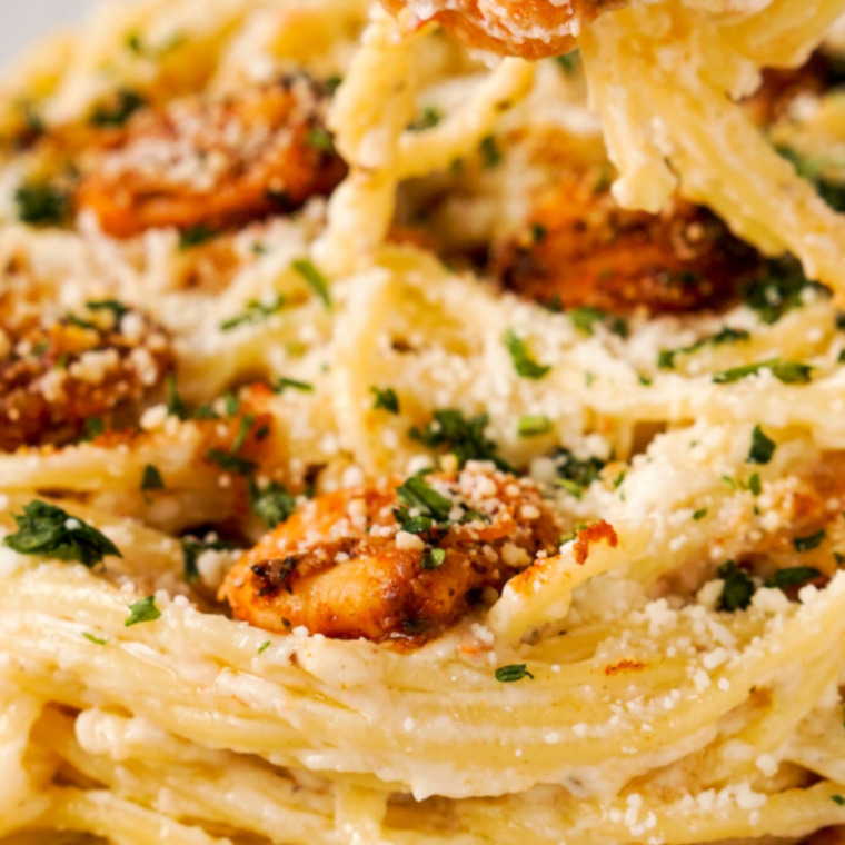 "Delicious Copycat Red Lobster Shrimp Scampi served in a garlic butter sauce with fresh parsley, perfect for seafood lovers."