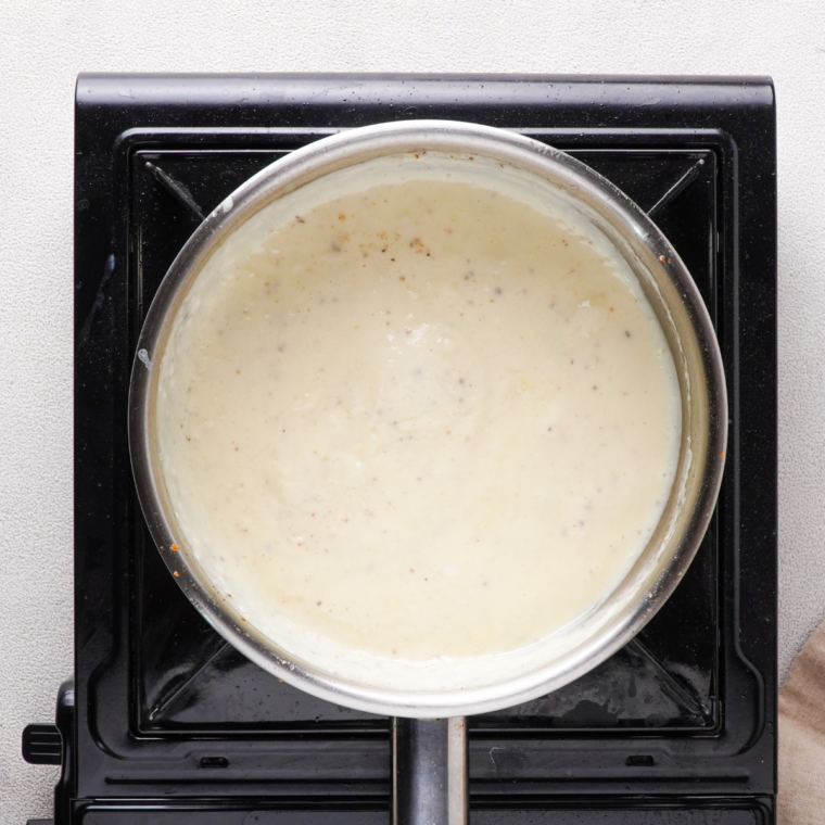 Add butter and minced garlic to the skillet, cooking for 1-2 minutes until fragrant but not browned.