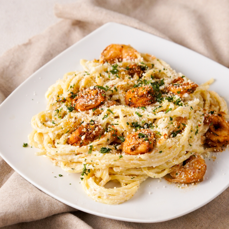 Delicious plate of Copycat Red Lobster Shrimp Scampi with shrimp, garlic butter sauce, and pasta.