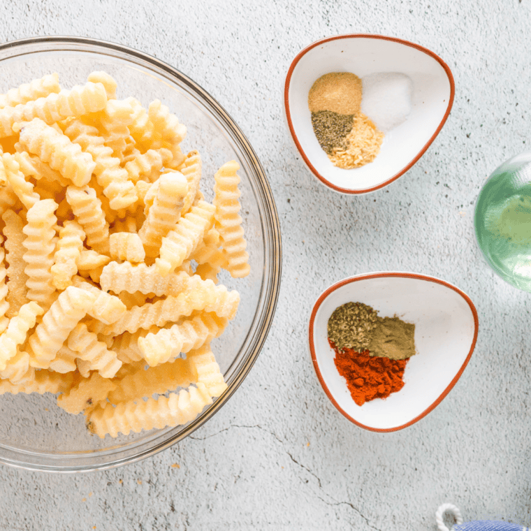 Ingredients needed for French Fry Seasoning (Red Robin Copycat) on kitchen table.