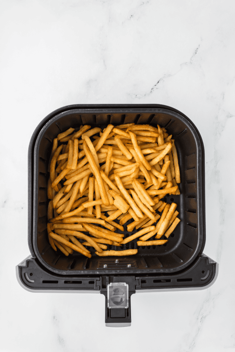 "Melt butter and sauté minced garlic in a saucepan until fragrant for Red Robin Parmesan Garlic Fries."