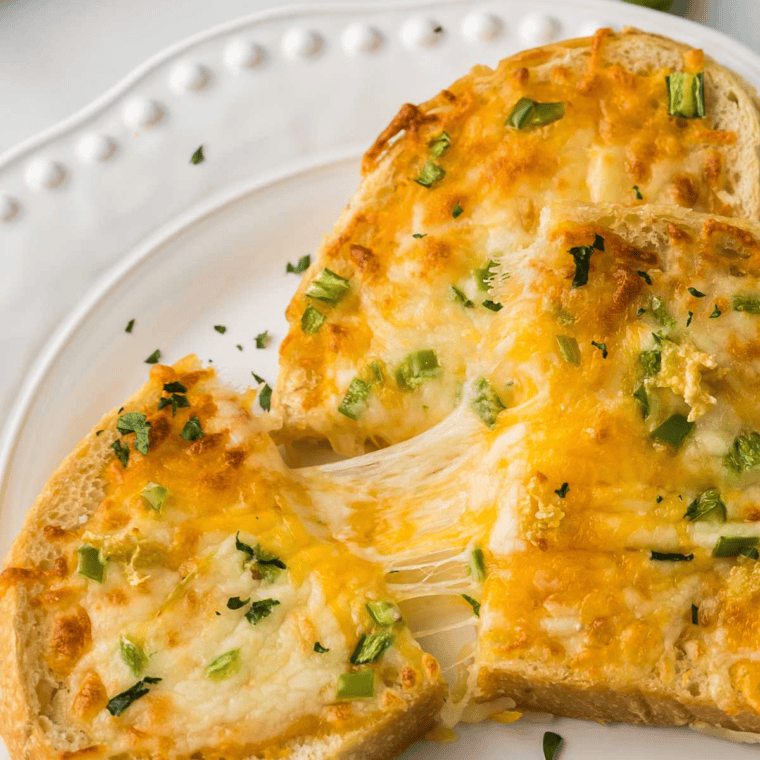 Air Fryer Chile Cheese Toast topped with melted cheese and spicy serrano chiles