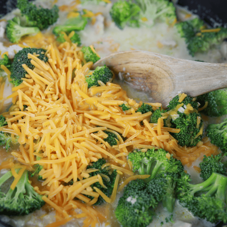 Broccoli florets and shredded cheddar stirred into creamy rice