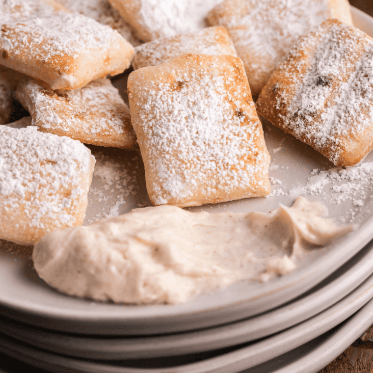 Delicious homemade Domino's Garlic Parmesan Sauce in a bowl, creamy and rich in flavor.