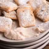 Domino's-style garlic parmesan sauce served with pizza and breadsticks.