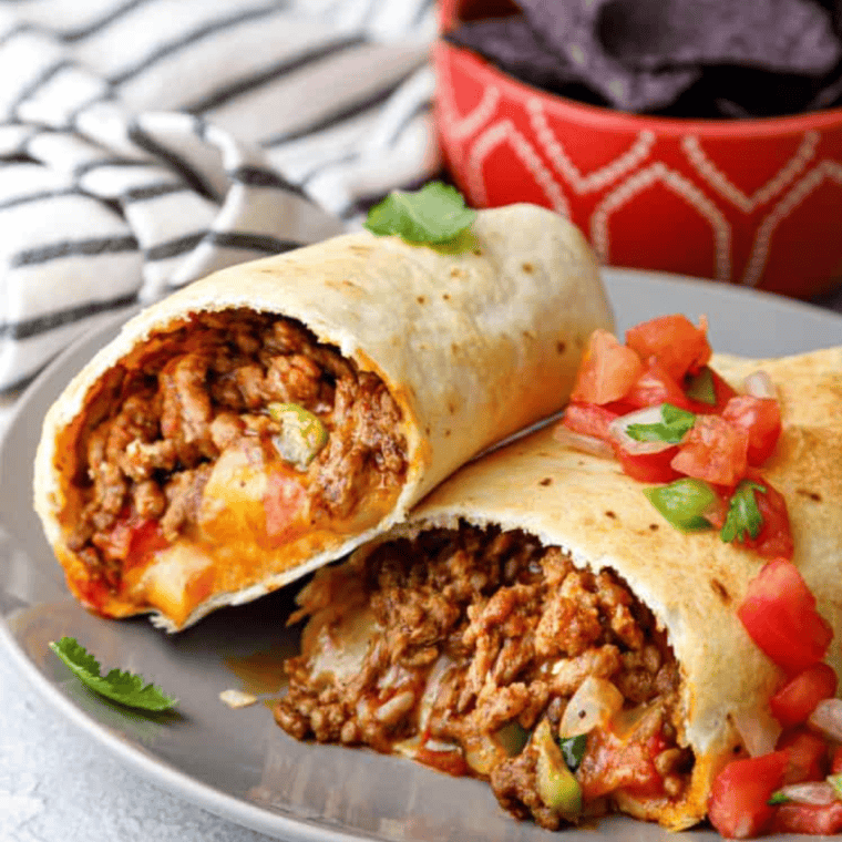 Make crispy, golden Air Fryer Beef Chimichangas at home! A healthier twist on a Mexican classic, packed with seasoned beef and melty cheese.