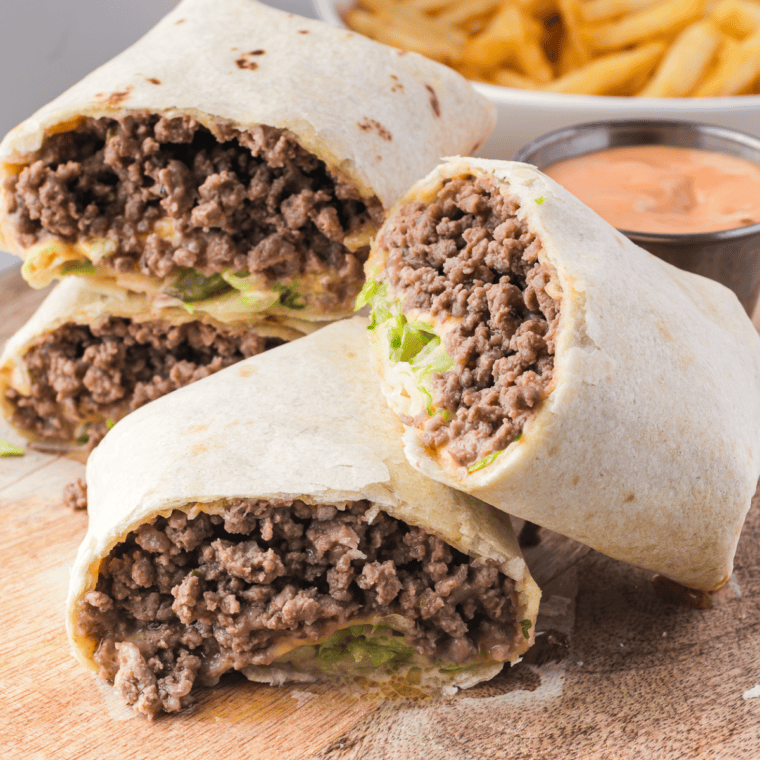 Golden, crispy Air Fryer Big Mac Wraps filled with beef, cheese, lettuce, onions, and pickles.