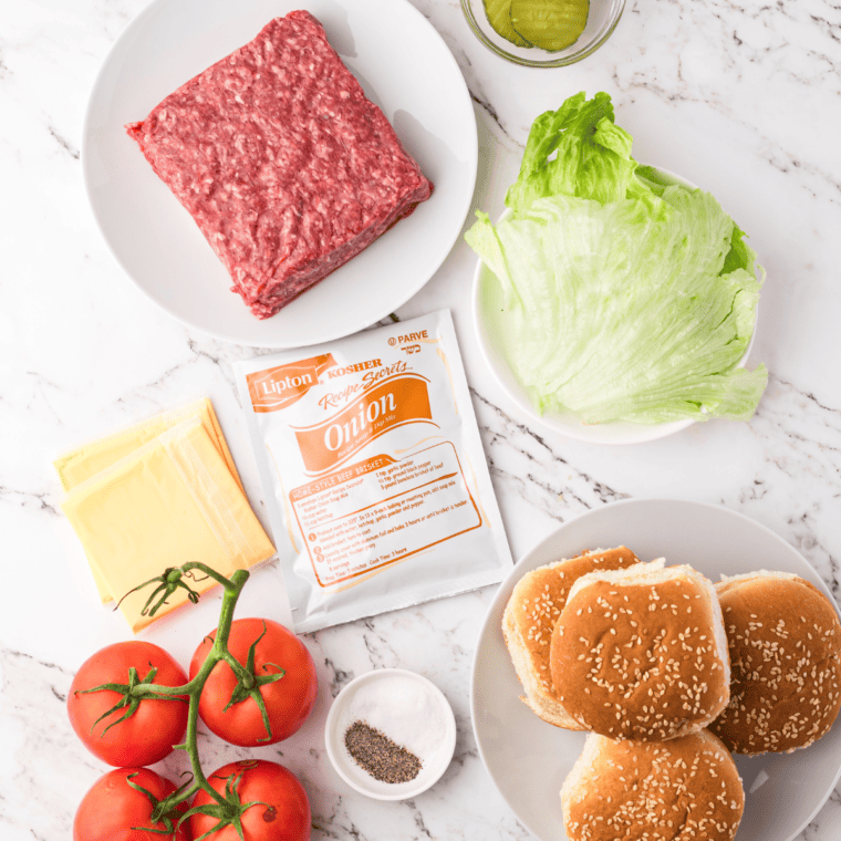 Ingredients for air fryer Lipton onion soup mix burgers including ground beef, Lipton onion soup packet, Worcestershire sauce, salt, pepper, and brioche buns"