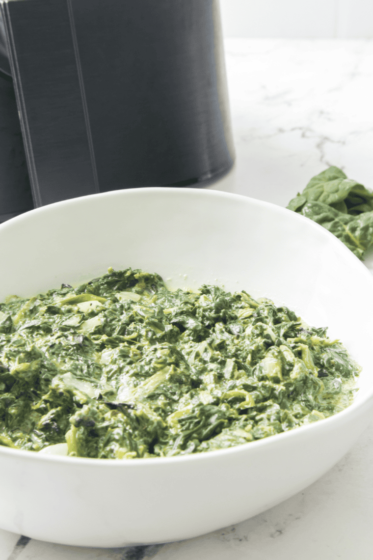 Delicious and creamy creamed spinach served as a side dish