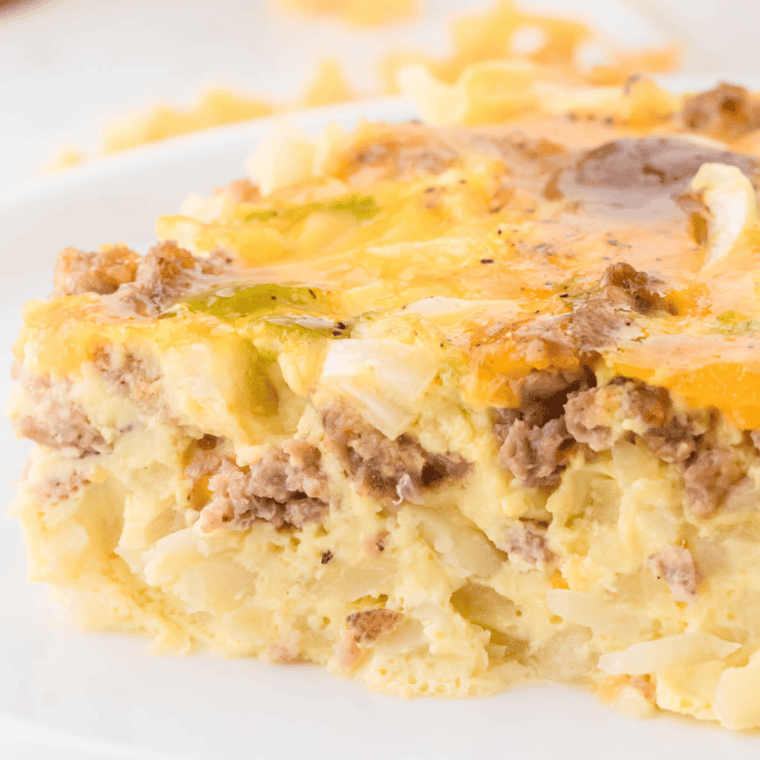A hearty crockpot breakfast casserole sliced and ready to serve for brunch