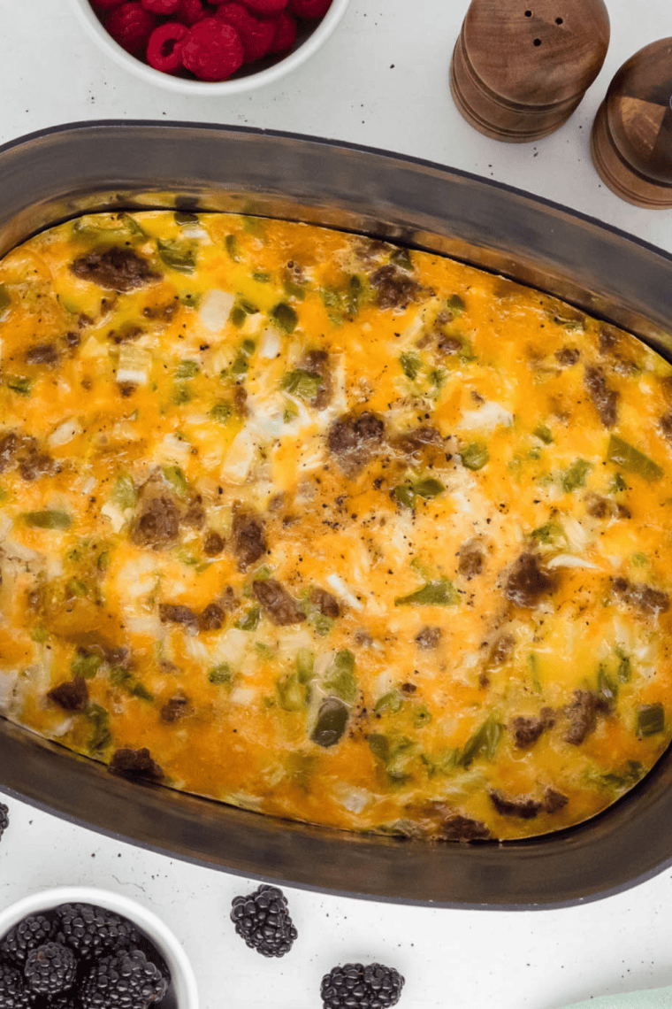 Slow cooker breakfast casserole loaded with eggs, sausage, cheese, and hash browns — an easy hands-off crockpot breakfast