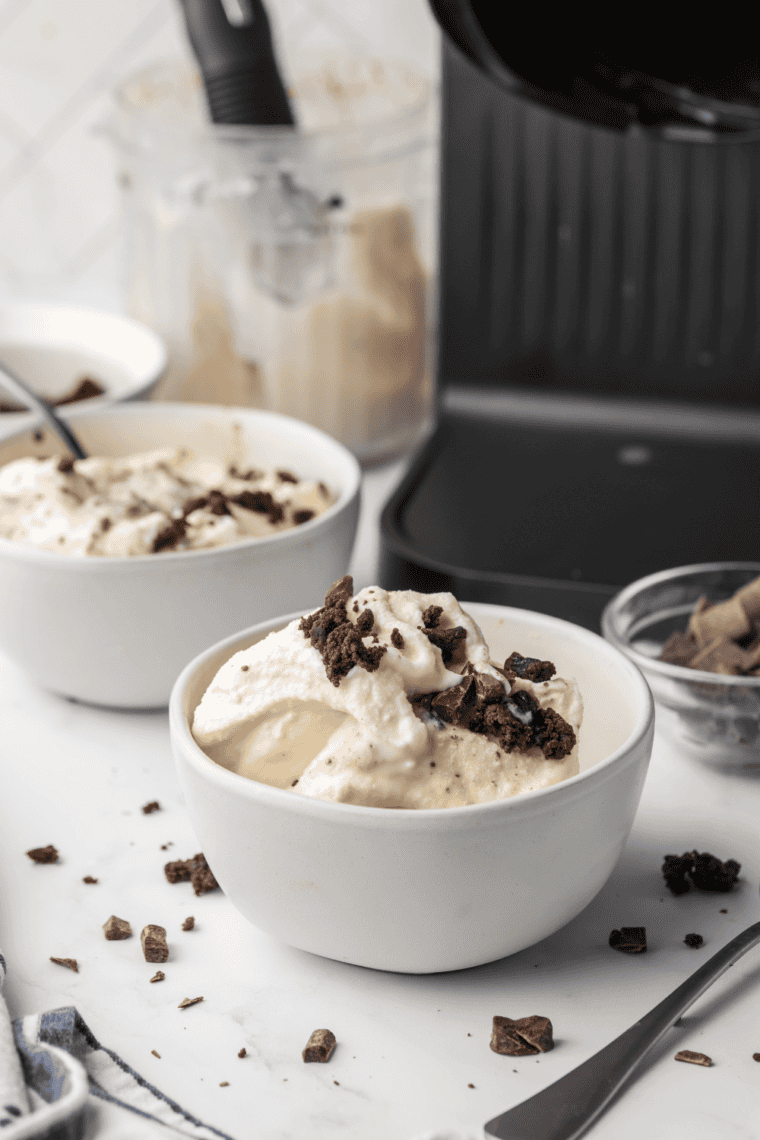 Sonic Blast Chocolate Chunk Brownie Copycat Ninja Creami in a bowl with chocolate chunks and brownie pieces.