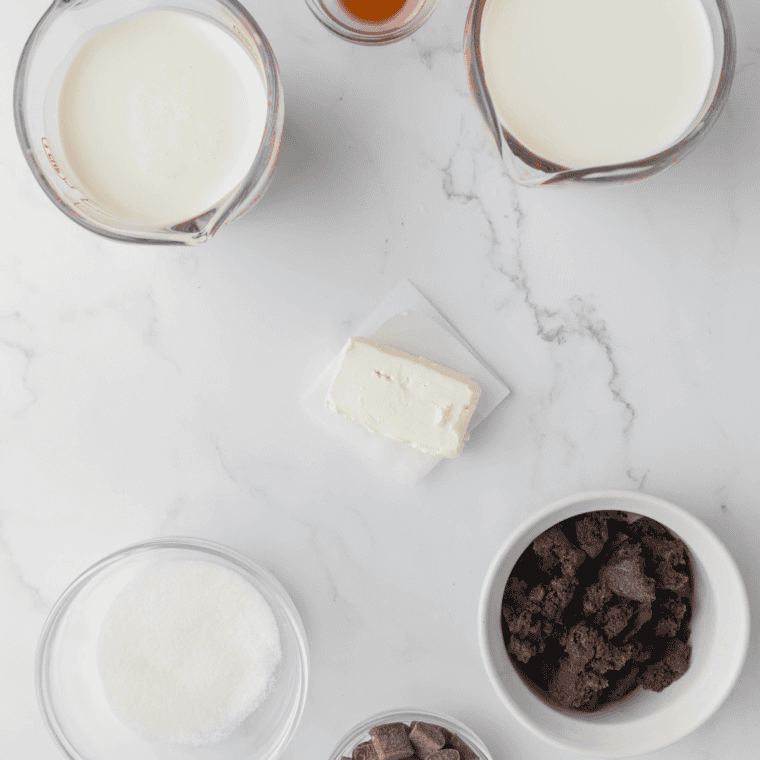 Ingredients needed for Sonic Blast Chocolate Chunk Brownie Copycat Ninja Creami Recipe on kitchen table.