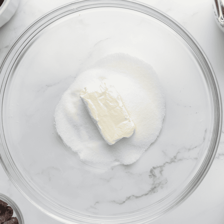 In a mixing bowl, soften cream cheese and combine with sugar and vanilla extract.