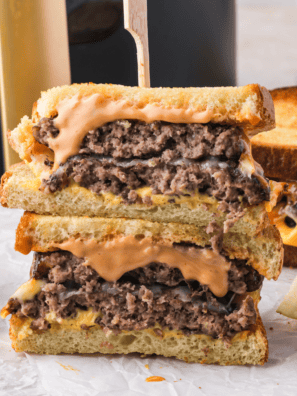 Steak and Shake Frisco Patty Melt with beef, cheese, and Thousand Island dressing on toasted sourdough.