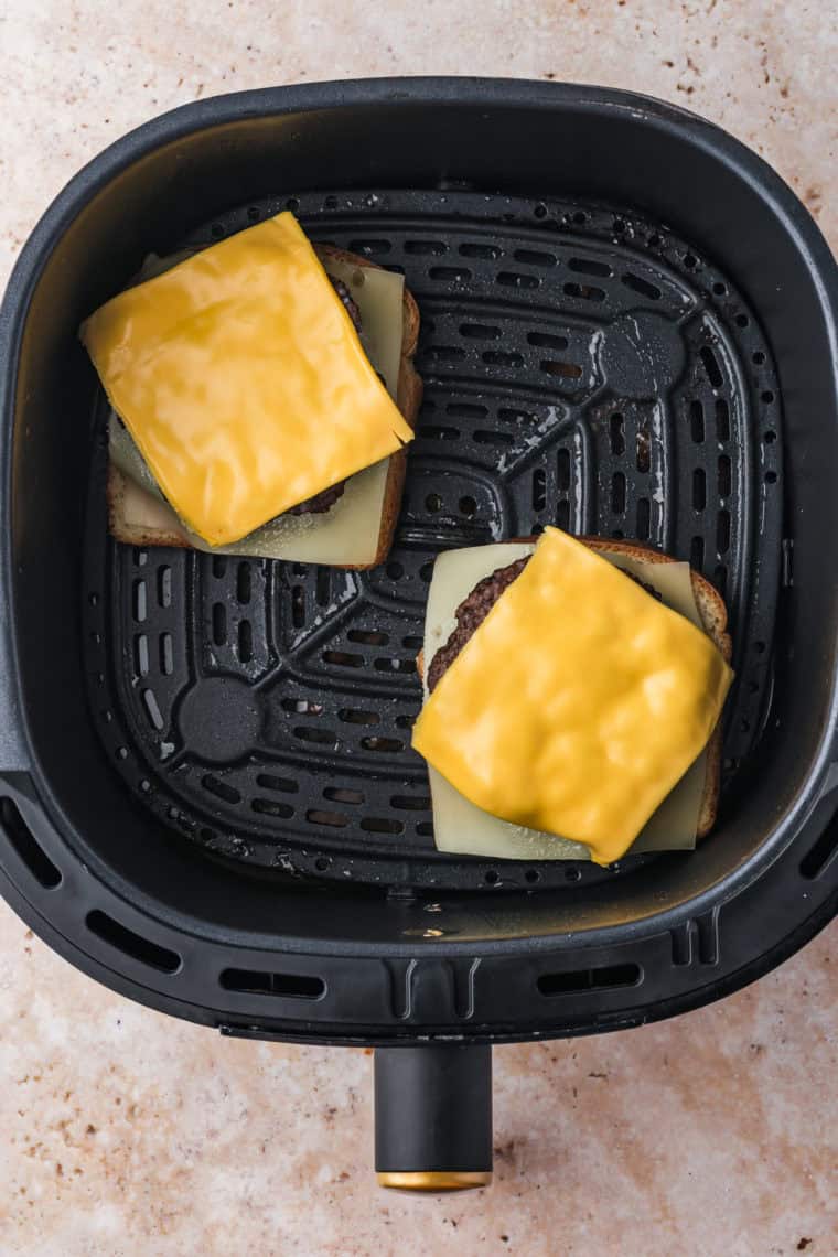 Butter bread, assemble Frisco Patty Melts, and air fry until golden and crispy.