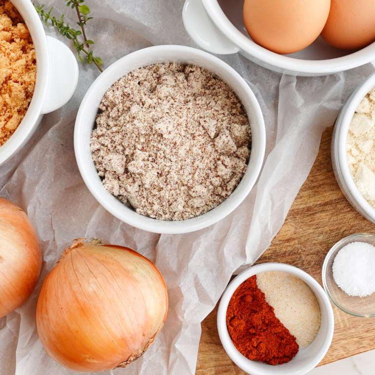 Ingredients needed for Air Fryer Keto Onion Rings on kitchen table.