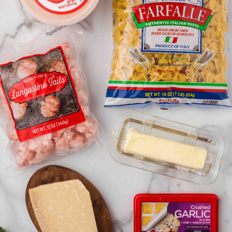 Ingredients needed for Air Fryer Lobster Bisque Pasta on kitchen table.