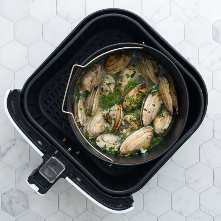 Air Fryer Steamed Clams served in a bowl with garlic butter and herbs